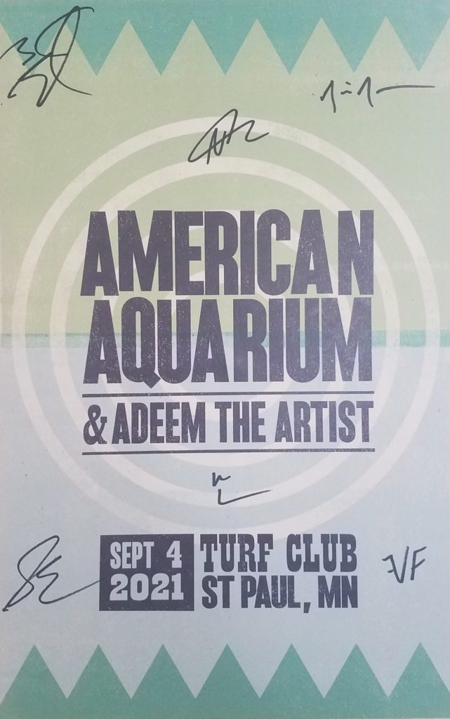 Picture of signed concert poster I got at the show